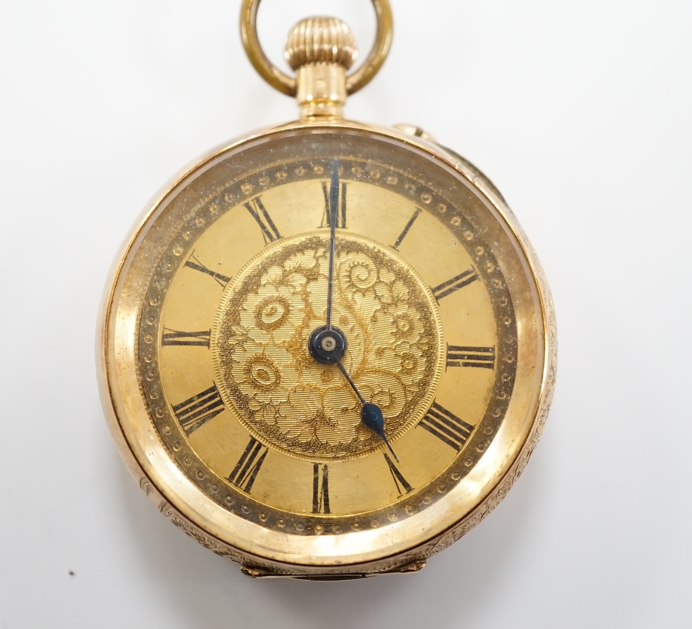 A continental 14k open face keyless fob watch, with Roman dial